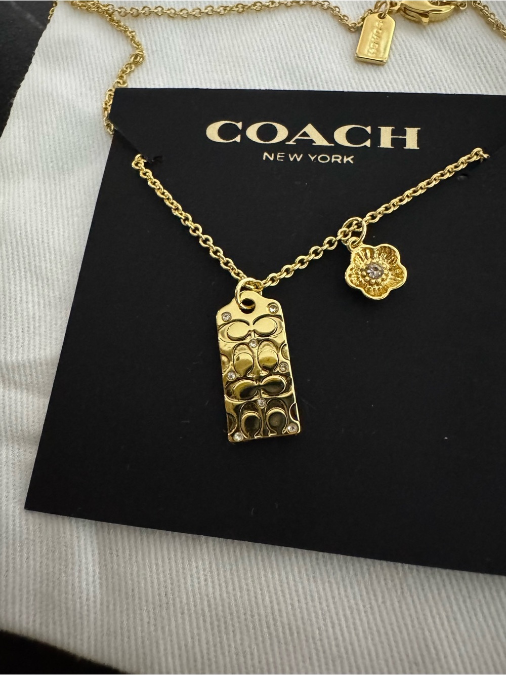 Coach Gold-Tone Logo Tag and Flower Charm Necklace - Picture 7 of 7